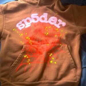 Selling a brown red and pink sp5der hoodie.